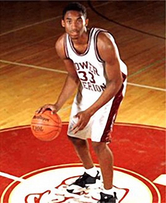 Picture 1 of Kobe Bryant with his Lower Marion High School basketball uniform